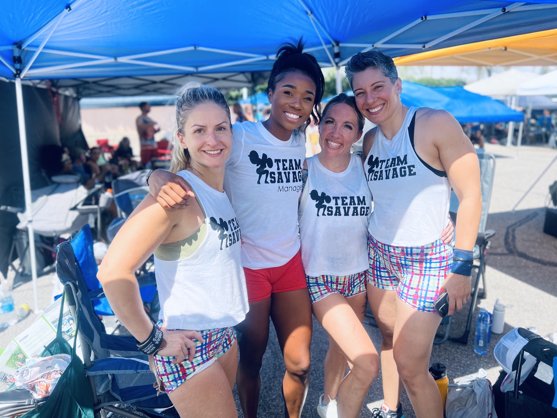 Coach Dom with three women at a fitness event