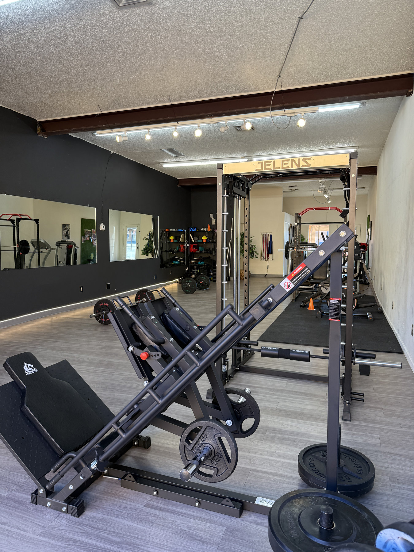Open floor and strength equipment at The Blueprint private studio in Tucson
